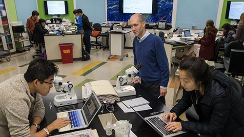 professor and students in a classroom